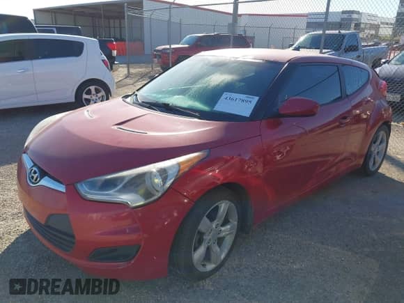 2013 Hyundai Veloster w/Black Int с VIN KMHTC6AD9DU093846, выставлен на аукционе IAAI как лот 43617895 с пробегом 179 710 миль миль и . История ставок и продаж доступна на DreamBid. Изображение 2.