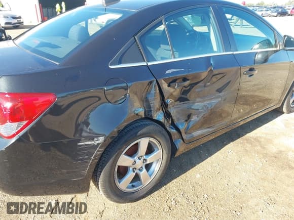 ✅ 2016 Chevrolet Cruze LT • VIN: 1G1PE5SB3G7165823 • Lot: 43393094. Listed on IAAI with 68,339 mi. Free auction sales archive from the USA and detailed vehicle history report at DreamBid. Image 6.