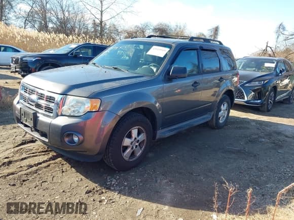 ✅ 2009 Ford Escape XLT • VIN: 1FMCU03799KC86292 • Lot: 43915919. Listed on IAAI with 163,766 mi. Free auction sales archive from the USA and detailed vehicle history report at DreamBid. Image 2.
