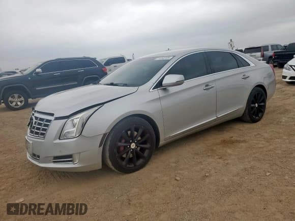 ✅ 2013 Cadillac XTS Luxury • VIN: 2G61R5S39D9222310 • Lot: 71752725. Listed on Copart with 84,925 mi. Free auction sales archive from the USA and detailed vehicle history report at DreamBid. Image 1.