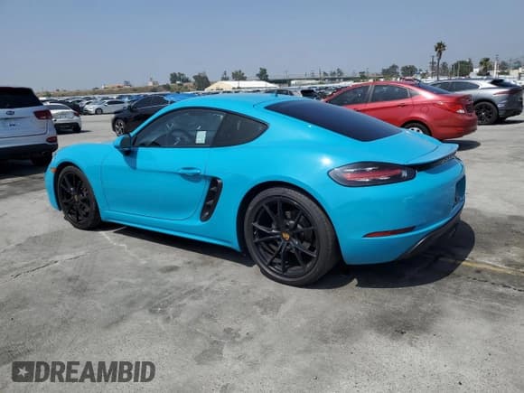 ✅ 2018 Porsche 718 Cayman • VIN: WP0AA2A86JK261947 • Лот: 51666454. Опубликован ранее на Copart с пробегом 71 309 миль. Бесплатный доступ к архиву аукционных продаж из США и подробный отчёт об истории автомобиля на DreamBid. Изображение 2.