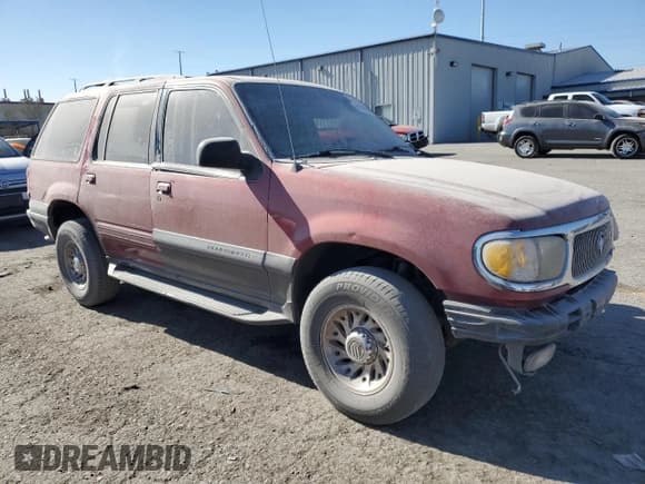 ✅ 1999 Mercury Mountaineer • VIN: 4M2ZU52E6XUJ43842 • Lot: 88141505. Listed on Copart with 194,187 mi. Free auction sales archive from the USA and detailed vehicle history report at DreamBid. Image 4.