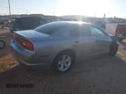 ✅ 2013 Dodge Charger SE • VIN: 2C3CDXBG6DH701961 • Lot: 43355152. Listed on IAAI with 113,746 mi. Free auction sales archive from the USA and detailed vehicle history report at DreamBid. Image 4.