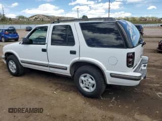 ✅ 1999 Chevrolet Blazer Trailblazer • VIN: 1GNDT13W0X2169505 • Lot: 54000505. Wystawiony na Copart z przebiegiem 181 903 mil. Bezpłatny archiwum sprzedaży aukcyjnych z USA i szczegółowy raport historii pojazdu na DreamBid. Zdjęcie 2.