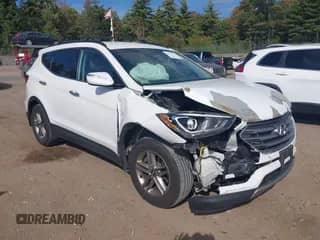 2018 Hyundai Santa Fe 2.4L z VIN 5NMZUDLB6JH078395, wystawiony jako IAAI lot #43277067 z przebiegiem 82 038 mil mil oraz . Historia ofert i sprzedaży dostępna na DreamBid. Obrazek 1.