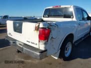 ✅ 2009 Nissan Titan LE • VIN: 1N6BA07D79N318614 • Lot: 43460475. Listed on IAAI with 232,157 mi. Free auction sales archive from the USA and detailed vehicle history report at DreamBid. Image 19.