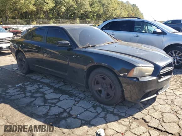 ✅ 2013 Dodge Charger Police • VIN: 2C3CDXAT3DH587898 • Lot: 90938085. Wystawiony na Copart z przebiegiem 193 915 mil. Bezpłatny archiwum sprzedaży aukcyjnych z USA i szczegółowy raport historii pojazdu na DreamBid. Zdjęcie 4.