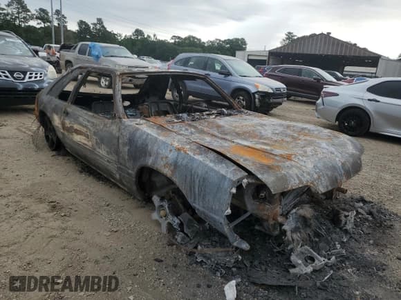 ✅ 1987 Ford Mustang • VIN: 1FABP41A5HF135072 • Lot: 57586605. Listed on Copart with Not provided. Free auction sales archive from the USA and detailed vehicle history report at DreamBid. Image 4.