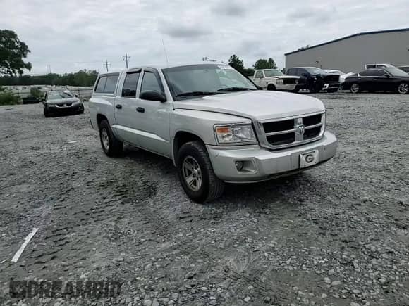 2008 Dodge Dakota SLT с VIN 1D7HE48N28S506012, выставлен на аукционе Copart как лот 63875014 с пробегом 121 562 миль миль и Списание • Salvage title. История ставок и продаж доступна на DreamBid. Изображение 10.