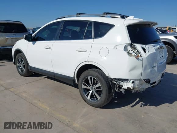 ✅ 2018 Toyota RAV4 XLE • VIN: JTMWFREV2JD132897 • Lot: 43310664. Listed on IAAI with 96,612 mi. Free auction sales archive from the USA and detailed vehicle history report at DreamBid. Image 3.