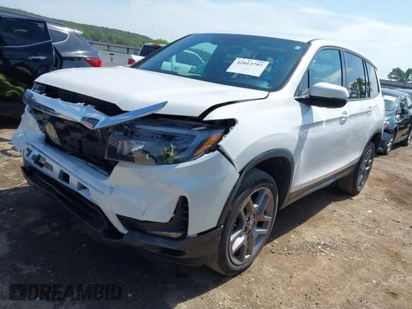 ✅ 2023 Honda Passport EX-L • VIN: 5FNYF8H53PB008136 • Lot: 42813797. Listed on IAAI with 26,970 mi. Free auction sales archive from the USA and detailed vehicle history report at DreamBid. Image 17.