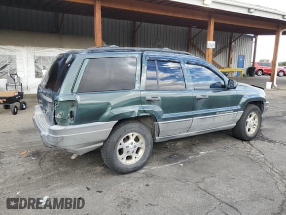 ✅ 2001 Jeep Grand Cherokee Laredo • VIN: 1J4GW48S61C596039 • Lot: 85932785. Listed on Copart with 185,240 mi. Free auction sales archive from the USA and detailed vehicle history report at DreamBid. Image 3.