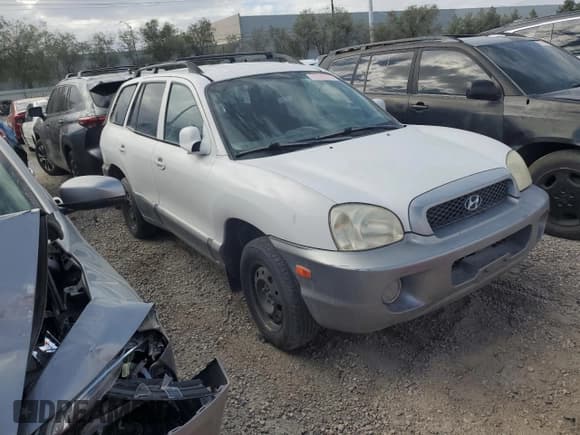 ✅ 2002 Hyundai Santa Fe GLS • VIN: KM8SC73D92U175975 • Лот: 71291915. Опубликован ранее на Copart с пробегом 124 648 миль. Бесплатный доступ к архиву аукционных продаж из США и подробный отчёт об истории автомобиля на DreamBid. Изображение 4.