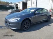 ✅ 2021 Tesla Model S Plaid • VIN: 5YJSA1E66MF456357 • Lot: 42130286. Listed on IAAI with 48,010 mi. Free auction sales archive from the USA and detailed vehicle history report at DreamBid. Image 2.