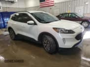 ✅ 2020 Ford Escape Titanium • VIN: 1FMCU9J99LUB15711 • Lot: 86680545. Listed on Copart with 75,531 mi. Free auction sales archive from the USA and detailed vehicle history report at DreamBid. Image 4.