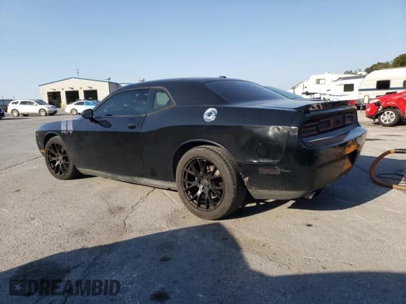 ✅ 2013 Dodge Challenger R/T Plus • VIN: 2C3CDYBT9DH524051 • Lot: 73693434. Wystawiony na Copart z przebiegiem 193 624 mil. Bezpłatny archiwum sprzedaży aukcyjnych z USA i szczegółowy raport historii pojazdu na DreamBid. Zdjęcie 2.