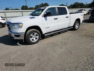 2023 Ram 1500 Big Horn with VIN 1C6SRFMT1PN628076, listed as a Copart auction lot 71742945 with 76,500 mi miles and Salvage title. Bid and sale history available at DreamBid. Image 1.