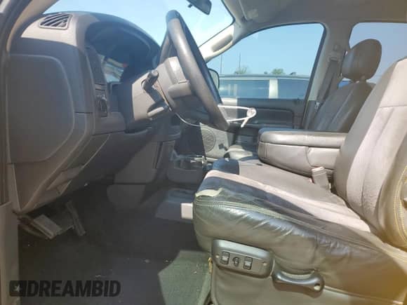 2004 Dodge 1500 SLT z VIN 1D7HU18D14J291084, wystawiony jako Copart lot #66081264 z przebiegiem 206 919 mil mil oraz Nie do naprawy • Non repairable. Historia ofert i sprzedaży dostępna na DreamBid. Obrazek 7.