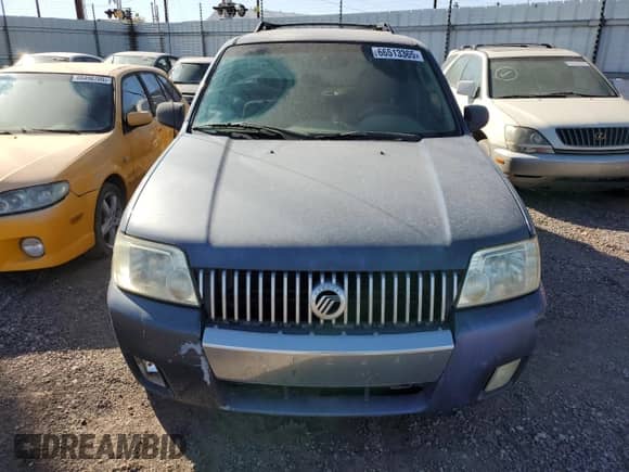 2005 Mercury Mariner Luxury with VIN 4M2YU56145DJ15201, listed as a Copart auction lot 66513365 with 136,184 mi miles and Clean title. Bid and sale history available at DreamBid. Image 5.