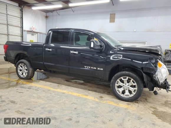 ✅ 2017 Nissan Titan SV • VIN: 1N6AA1F22HN553230 • Лот: 71956354. Опубликован ранее на Copart с пробегом Не указан. Бесплатный доступ к архиву аукционных продаж из США и подробный отчёт об истории автомобиля на DreamBid. Изображение 4.