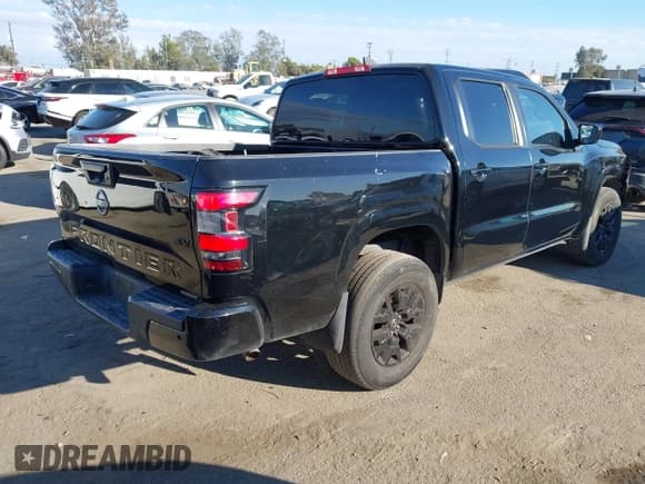 ✅ 2023 Nissan Frontier Pro-X • VIN: 1N6ED1EJ9PN608479 • Lot: 43426950. Listed on IAAI with 56,771 mi. Free auction sales archive from the USA and detailed vehicle history report at DreamBid. Image 4.