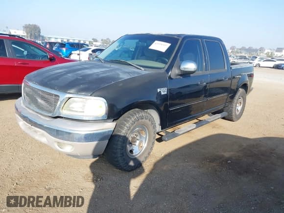 ✅ 2002 Ford F-150 XLT • VIN: 1FTRW07642KD38282 • Lot: 43599357. Listed on IAAI with 184,938 mi. Free auction sales archive from the USA and detailed vehicle history report at DreamBid. Image 2.