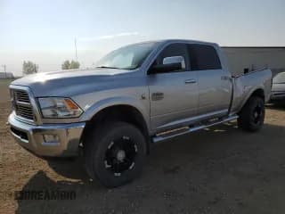 ✅ 2012 Dodge RAM • VIN: 3C63D3FL0CG218547 • Лот: 72048615. Опубликован ранее на Copart с пробегом 185 284 миль. Бесплатный доступ к архиву аукционных продаж из США и подробный отчёт об истории автомобиля на DreamBid. Изображение 1.