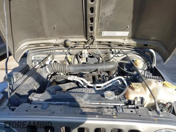 ✅ 2004 Jeep Wrangler Sahara • VIN: 1J4FA59S74P718659 • Lot: 43316154. Listed on IAAI with 144,737 mi. Free auction sales archive from the USA and detailed vehicle history report at DreamBid. Image 10.