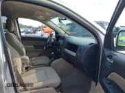 ✅ 2014 Jeep Compass Sport • VIN: 1C4NJCBAXED523634 • Lot: 42369567. Listed on IAAI with 130,015 mi. Free auction sales archive from the USA and detailed vehicle history report at DreamBid. Image 5.