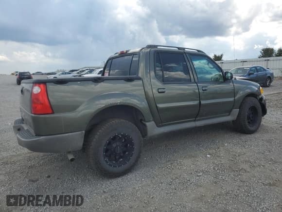 ✅ 2003 Ford Explorer Sport Trac XLS • VIN: 1FMZU77E23UA99709 • Lot: 71023125. Listed on Copart with 143,226 mi. Free auction sales archive from the USA and detailed vehicle history report at DreamBid. Image 3.