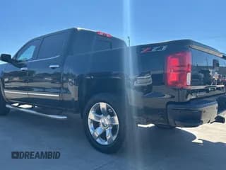 ✅ 2018 Chevrolet Silverado 1500 LTZ • VIN: 3GCUKSEC2JG265221 • Лот: 73342004. Опубликован ранее на Copart с пробегом 257 910 миль. Бесплатный доступ к архиву аукционных продаж из США и подробный отчёт об истории автомобиля на DreamBid. Изображение 3.