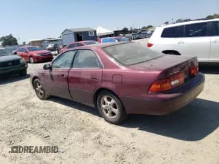 ✅ 1997 Lexus ES 300 • VIN: JT8BF22G0V0030408 • Lot: 66811844. Listed on Copart with 185,314 mi. Free auction sales archive from the USA and detailed vehicle history report at DreamBid. Image 2.