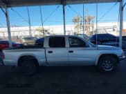 ✅ 2003 Dodge Dakota SLT • VIN: 1D7HL48N13S294573 • Lot: 41291127. Wystawiony na IAAI z przebiegiem 227 355 mil. Bezpłatny archiwum sprzedaży aukcyjnych z USA i szczegółowy raport historii pojazdu na DreamBid. Zdjęcie 13.