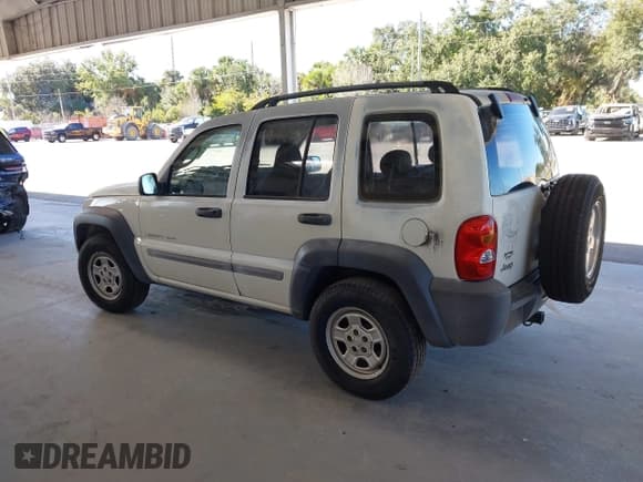 ✅ 2003 Jeep Liberty Sport • VIN: 1J4GK48K13W553970 • Lot: 43794068. Listed on IAAI with 209,519 mi. Free auction sales archive from the USA and detailed vehicle history report at DreamBid. Image 3.