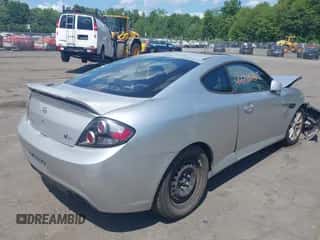 2008 Hyundai Tiburon GS с VIN KMHHM66D58U288179, выставлен на аукционе IAAI как лот 42786765 с пробегом 105 691 миль миль и . История ставок и продаж доступна на DreamBid. Изображение 4.