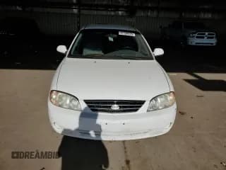 ✅ 2002 Kia Spectra • VIN: KNAFB121425152236 • Лот: 57139425. Опубликован ранее на Copart с пробегом 107 895 миль. Бесплатный доступ к архиву аукционных продаж из США и подробный отчёт об истории автомобиля на DreamBid. Изображение 5.