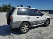 ✅ 1997 Toyota RAV4 • VIN: JT3GP10V8V0018317 • Lot: 63007065. Wystawiony na Copart z przebiegiem 257 869 mil. Bezpłatny archiwum sprzedaży aukcyjnych z USA i szczegółowy raport historii pojazdu na DreamBid. Zdjęcie 3.