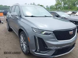 ✅ 2021 Cadillac XT6 Sport • VIN: 1GYKPGRS6MZ128112 • Lot: 42415342. Listed on IAAI with 57,680 mi. Free auction sales archive from the USA and detailed vehicle history report at DreamBid. Image 1.