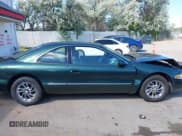 ✅ 1998 Lincoln Mark VIII • VIN: 1LNLM91V9WY601090 • Lot: 42703263. Wystawiony na IAAI z przebiegiem 82 243 mil. Bezpłatny archiwum sprzedaży aukcyjnych z USA i szczegółowy raport historii pojazdu na DreamBid. Zdjęcie 13.