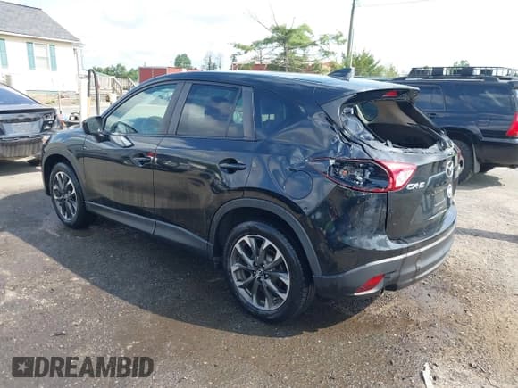 ✅ 2016 Mazda CX-5 Grand Touring • VIN: JM3KE2DY3G0727737 • Lot: 42922867. Wystawiony na IAAI z przebiegiem 71 475 mil. Bezpłatny archiwum sprzedaży aukcyjnych z USA i szczegółowy raport historii pojazdu na DreamBid. Zdjęcie 3.