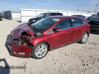 ✅ 2016 Ford Focus Titanium • VIN: 1FADP3N29GL326550 • Лот: 92865545. Опубликован ранее на Copart с пробегом 71 901 миль. Бесплатный доступ к архиву аукционных продаж из США и подробный отчёт об истории автомобиля на DreamBid. Изображение 1.