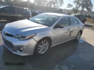 ✅ 2013 Toyota Avalon Limited • VIN: 4T1BK1EB9DU023631 • Lot: 93084325. Listed on Copart with 122,614 mi. Free auction sales archive from the USA and detailed vehicle history report at DreamBid. Image 1.