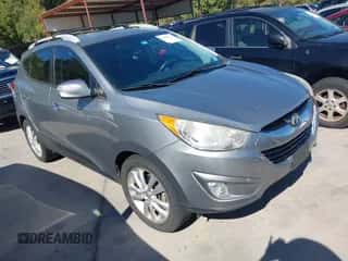 2012 Hyundai Tucson GLS with VIN KM8JU3AC9CU482947, listed as a IAAI auction lot 43502574 with 170,920 mi miles and . Bid and sale history available at DreamBid. Image 1.