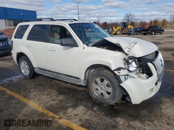 ✅ 2010 Mercury Mariner • VIN: 4M2CN9BG5AKJ07381 • Lot: 78217074. Listed on Copart with 96,362 mi. Free auction sales archive from the USA and detailed vehicle history report at DreamBid. Image 4.