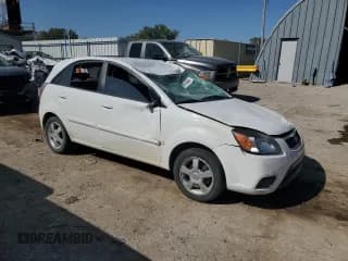 ✅ 2011 Kia Rio LX • VIN: KNADH5A39B6755340 • Lot: 74141444. Listed on Copart with 144,195 mi. Free auction sales archive from the USA and detailed vehicle history report at DreamBid. Image 4.