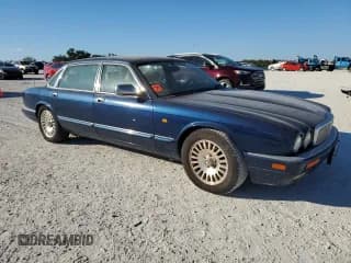 ✅ 1997 Jaguar XJ Vanden Plas • VIN: SAJKX6244VC801688 • Лот: 80841864. Опубликован ранее на Copart с пробегом Не указан. Бесплатный доступ к архиву аукционных продаж из США и подробный отчёт об истории автомобиля на DreamBid. Изображение 4.