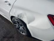 ✅ 2022 BMW 3 Series 330i xDrive • VIN: 3MW5R7J00N8C65787 • Lot: 43790437. Listed on IAAI with 21,124 mi. Free auction sales archive from the USA and detailed vehicle history report at DreamBid. Image 17.