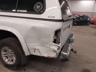 ✅ 2001 Dodge Dakota Sport • VIN: 1B7HG2ANX1S224497 • Lot: 41685903. Wystawiony na IAAI z przebiegiem 223 912 mil. Bezpłatny archiwum sprzedaży aukcyjnych z USA i szczegółowy raport historii pojazdu na DreamBid. Zdjęcie 6.