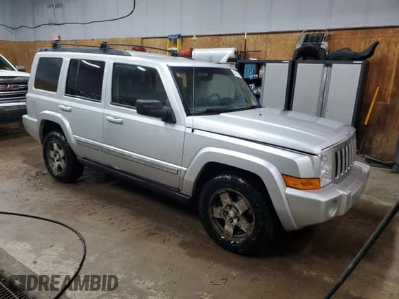 ✅ 2010 Jeep Commander Sport • VIN: 1J4RG4GK9AC124439 • Lot: 54749315. Listed on Copart with 150,204 mi. Free auction sales archive from the USA and detailed vehicle history report at DreamBid. Image 4.