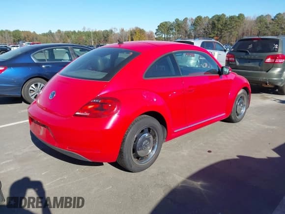 ✅ 2013 Volkswagen Beetle 2.5L • VIN: 3VWJX7AT3DM606295 • Lot: 43719520. Listed on IAAI with 241,920 mi. Free auction sales archive from the USA and detailed vehicle history report at DreamBid. Image 4.